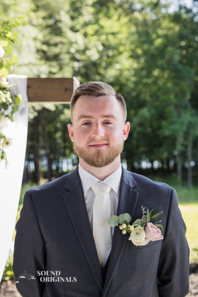 The groom waiting at the altar at The Oakley on the Lake Wedding