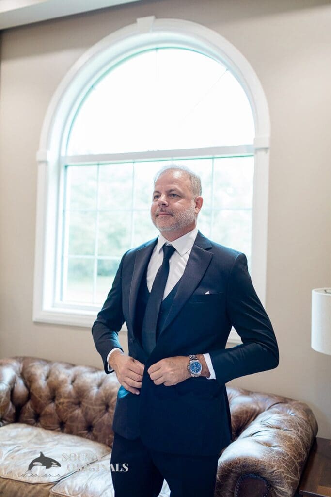 Harborside Chapel Wedding Groom preparing at the groom suite during the Harborside Chapel Wedding