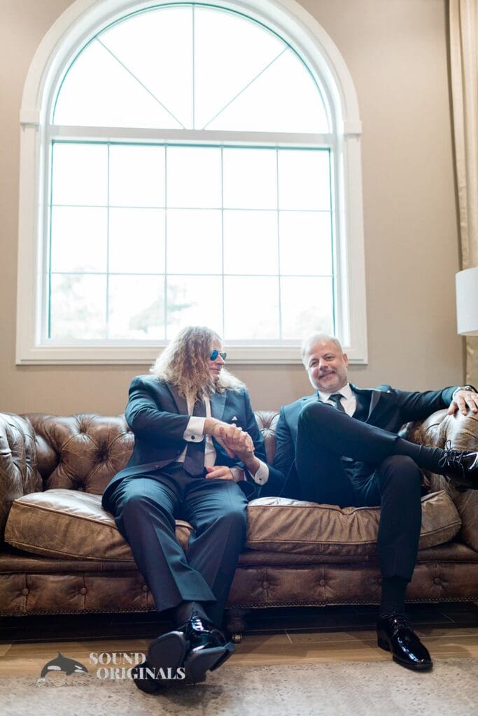Bestman and the groom shaking hands at the Harborside Chapel Wedding Harborside Chapel Wedding