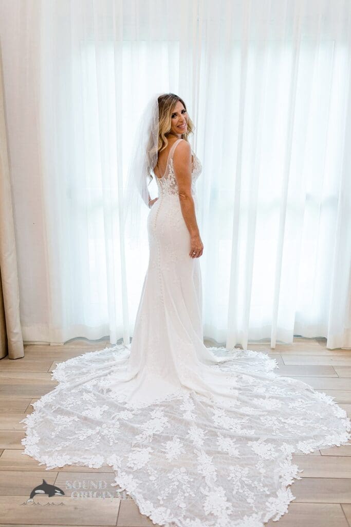 Harborside Chapel Wedding Bride with her long laced gown for the Harborside Chapel Wedding