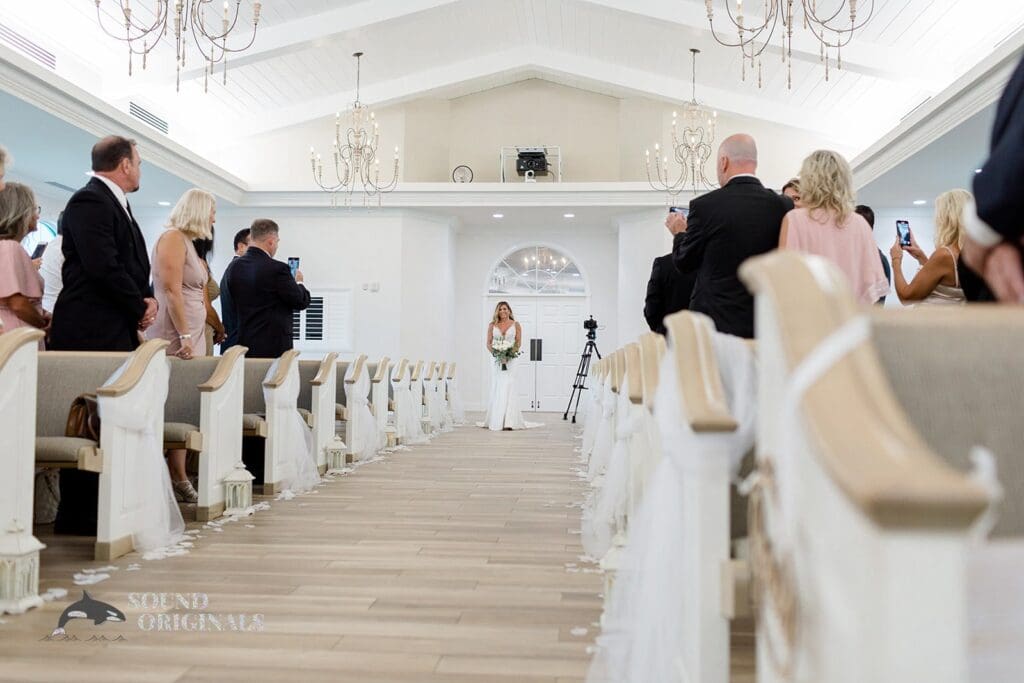 Harborside Chapel Wedding BRide walking down the aisle during the Harborside Chapel Wedding