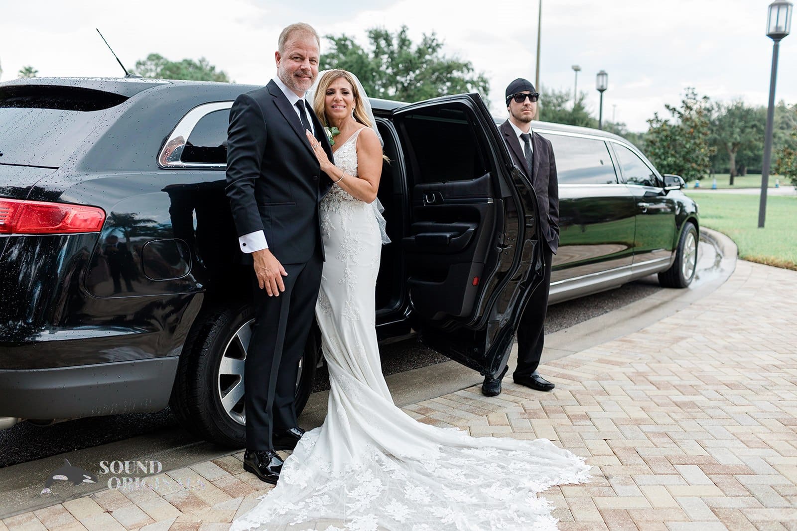 Newlyweds about to ride the limousine after the Harborside Chapel Wedding