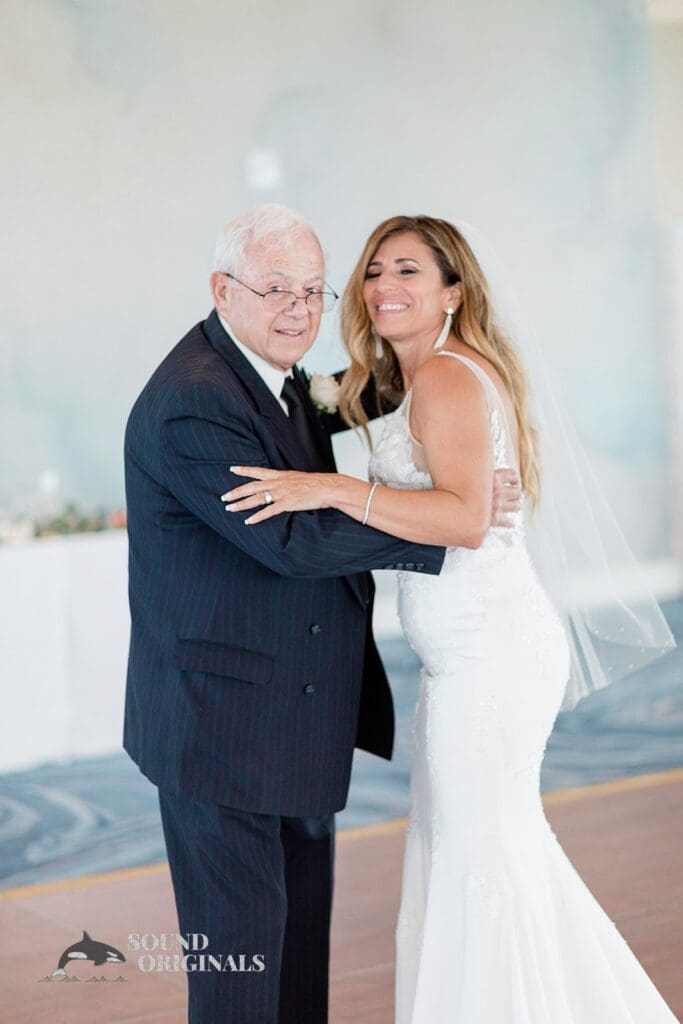 Harborside Chapel Wedding Bride and an elderly family member dance after the Harborside Chapel Wedding