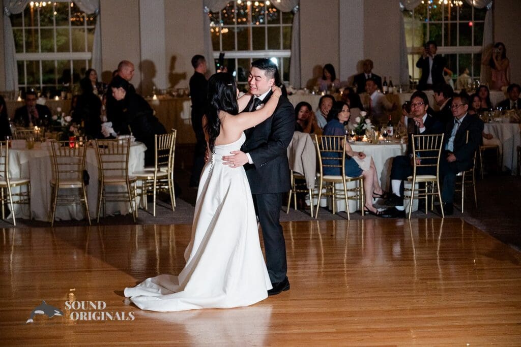 Bride and groom sharing first dance at The Abbington Distinctive Banquets Wedding reception
