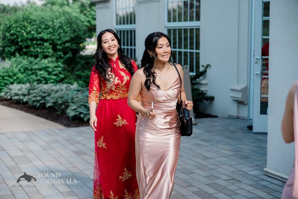 The arrival of the bride and bridesmaid at The Abbington Distinctive Banquets Wedding