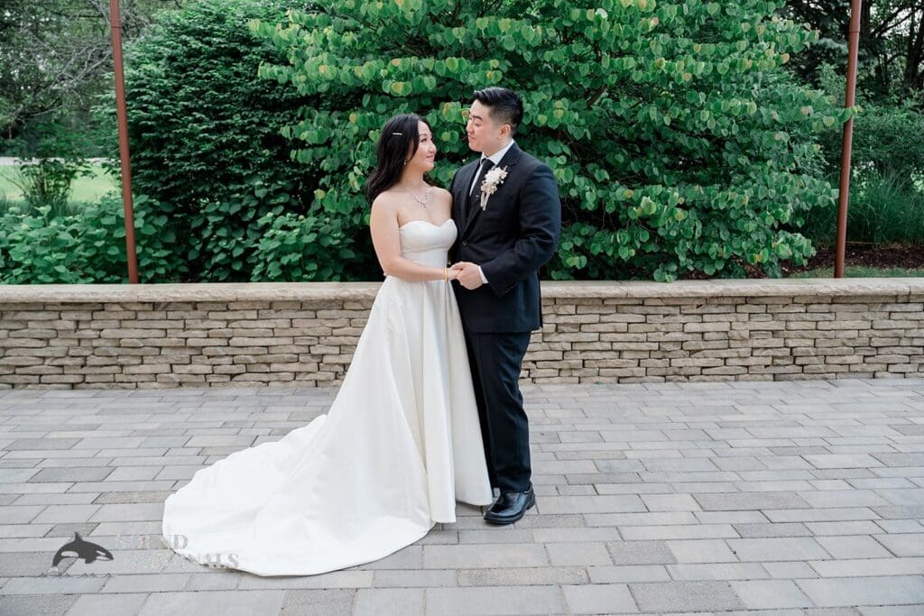 Wedding photographer captures gorgeous photo of bride and groom at The Abbington Distinctive Banquets Wedding