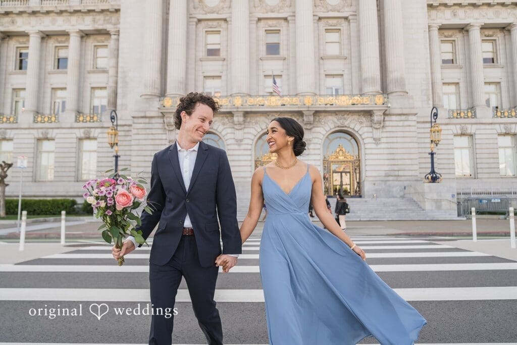 Engagement photo at San Francisco City Hall, one of the 24 Best Places for Engagement Photos in San Francisco, captured by our San Francisco wedding photography & videography team.