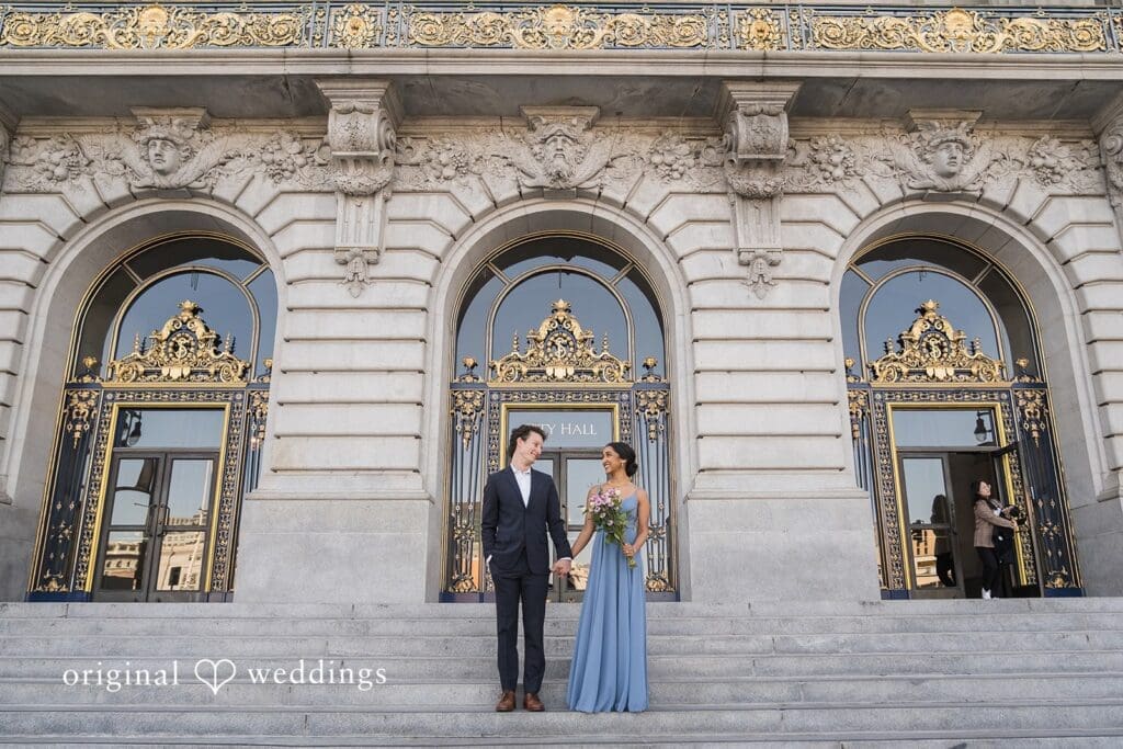 Engagement photo at San Francisco City Hall, one of the 24 Best Places for Engagement Photos in San Francisco, captured by our San Francisco wedding photography & videography team.