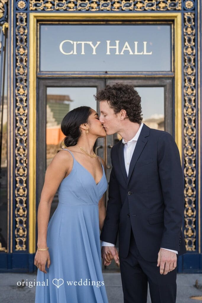 Engagement photo at San Francisco City Hall, one of the 24 Best Places for Engagement Photos in San Francisco, captured by our San Francisco wedding photography & videography team.