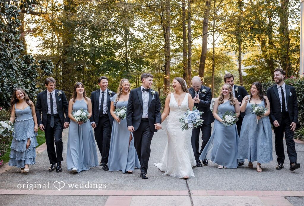 Kaitlyn + Justin Atlanta Wedding Photography from original weddings capturing full wedding party posing together along a path lined with green trees at The Cedars