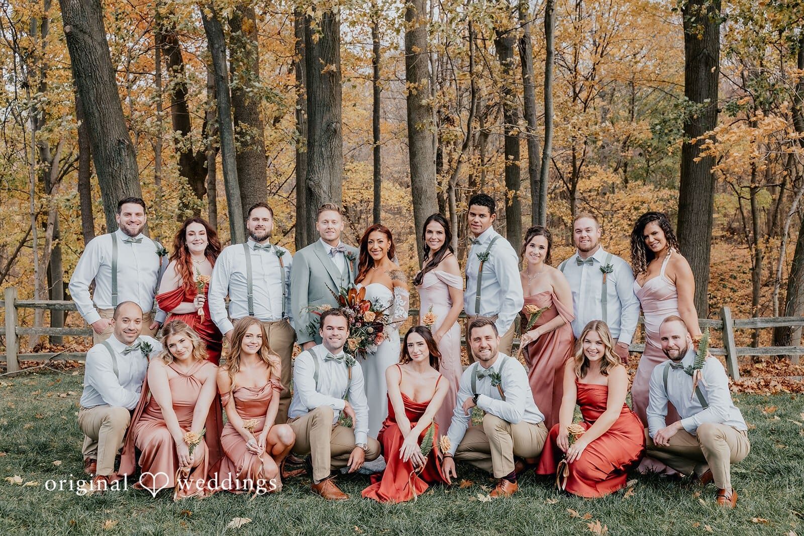 Our Chicago wedding photographer at Original Weddings captured a stunning portrait of the couple with their bridal party at the Apple Blossom Resort