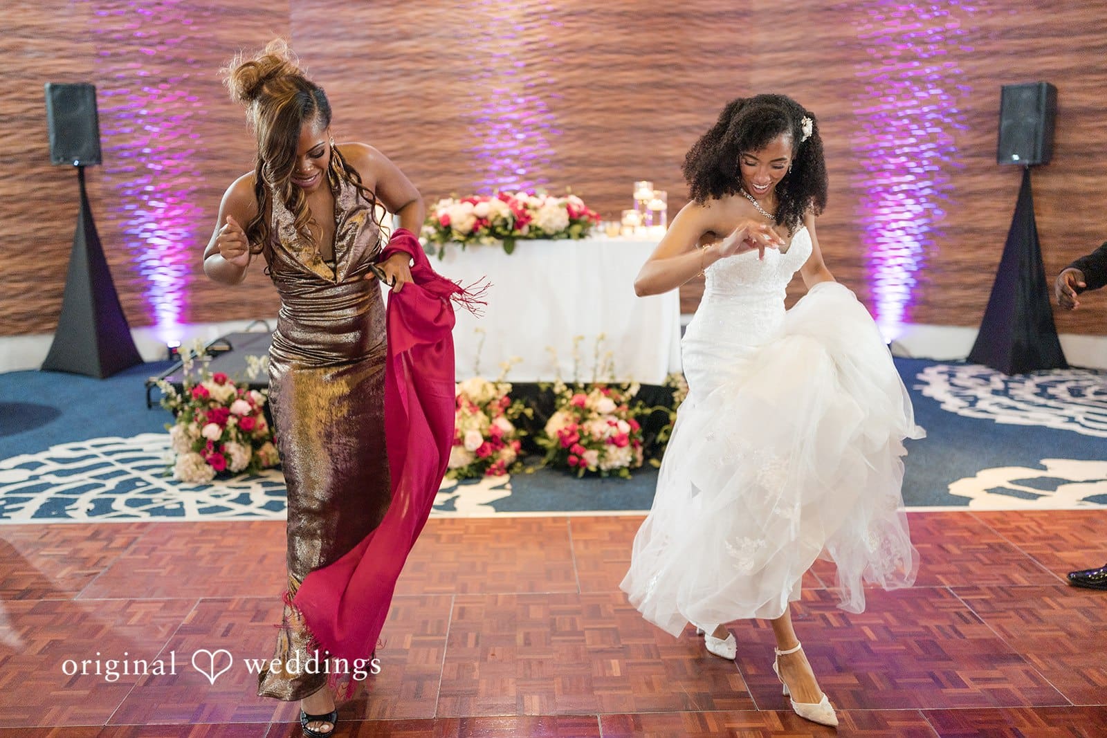 Ramon + Alexandra Bride dances joyfully with a female friend
