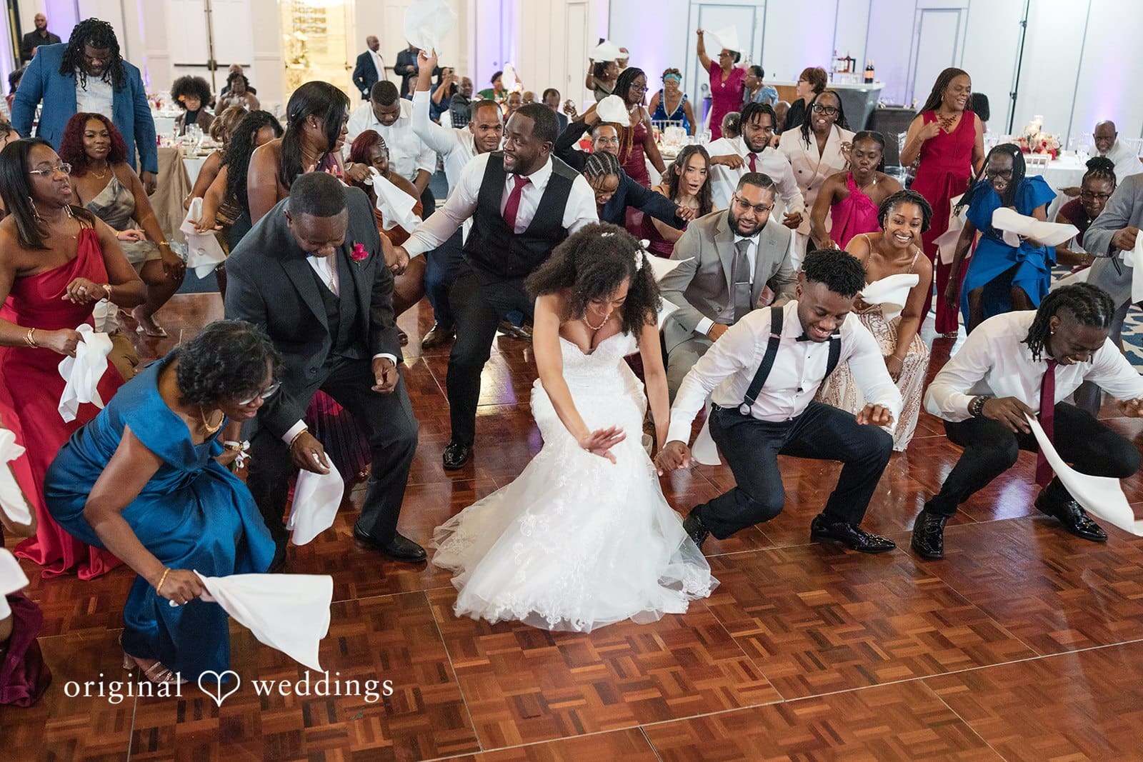 Ramon + Alexandra Guests dancing together at wedding captured by Miami wedding photographer at Bahia Mar Fort Lauderdale