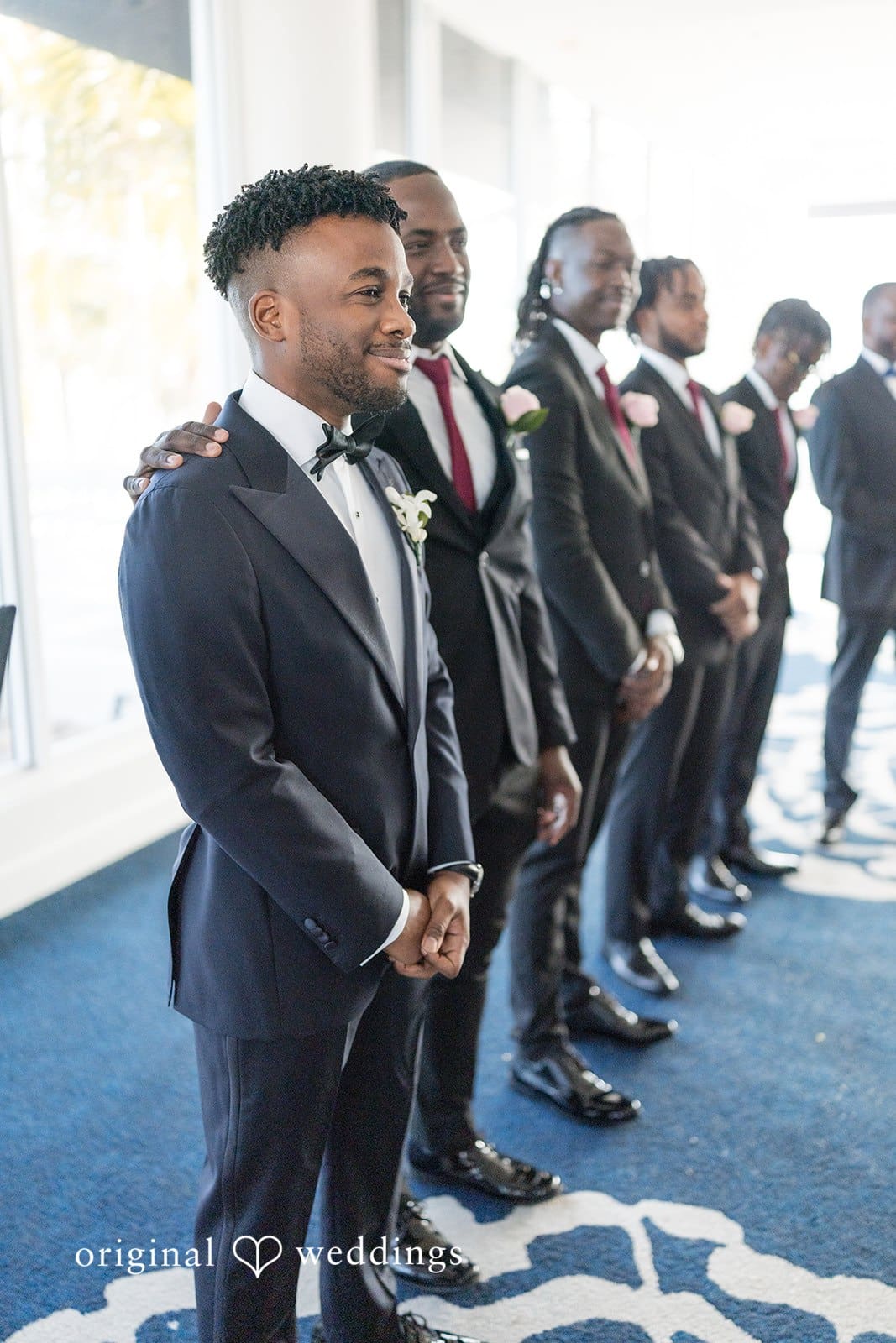 Ramon + Alexandra Groom waiting at altar with groomsmen