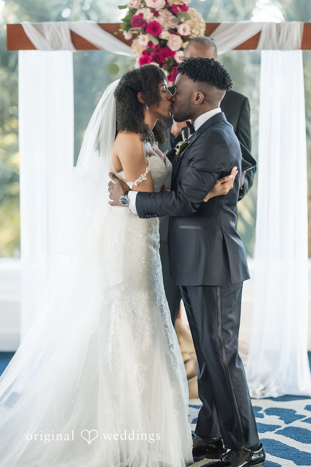 Ramon + Alexandra Bride and groom kissing after ceremony