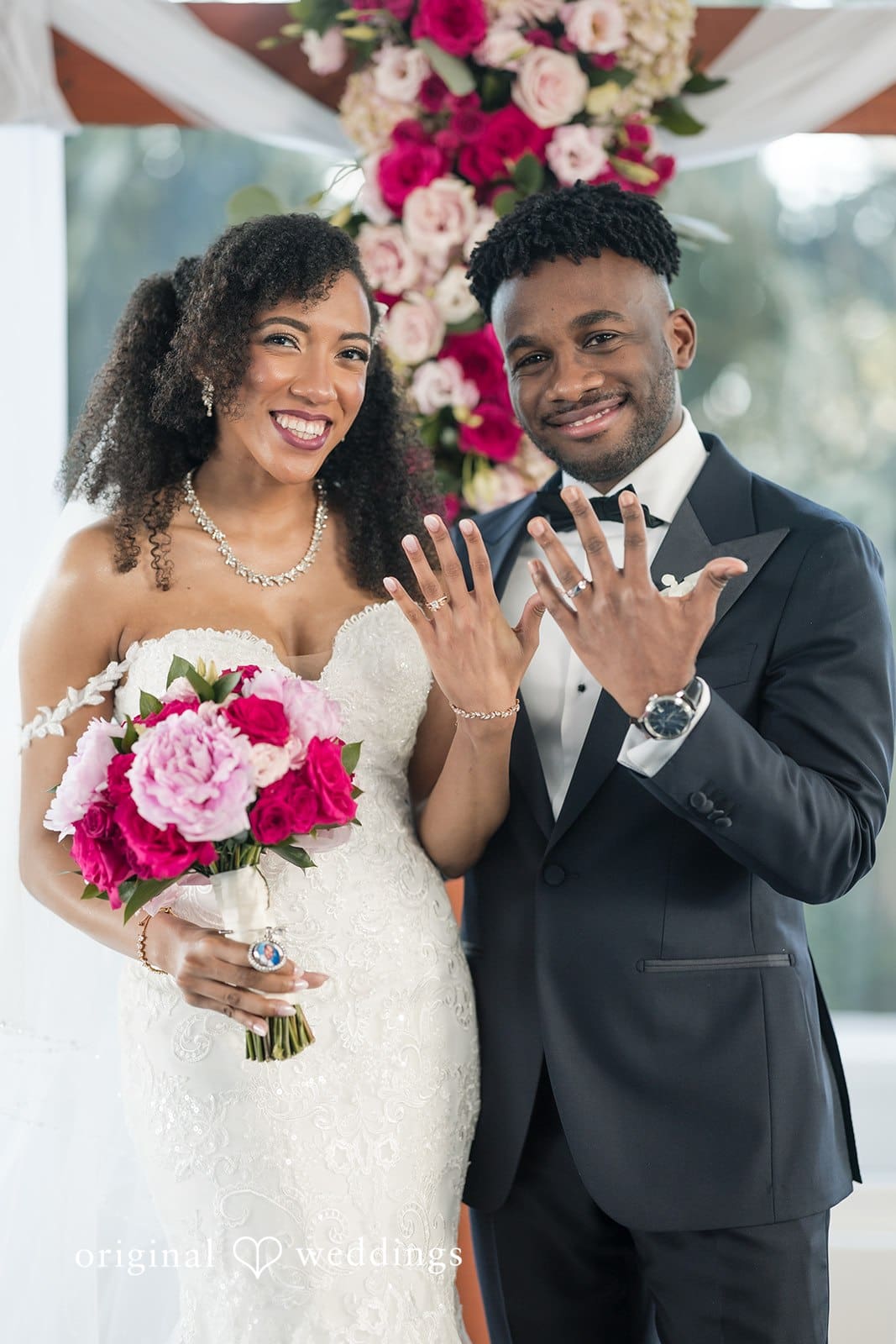 Ramon + Alexandra Close up of bride and groom hands showing wedding rings
