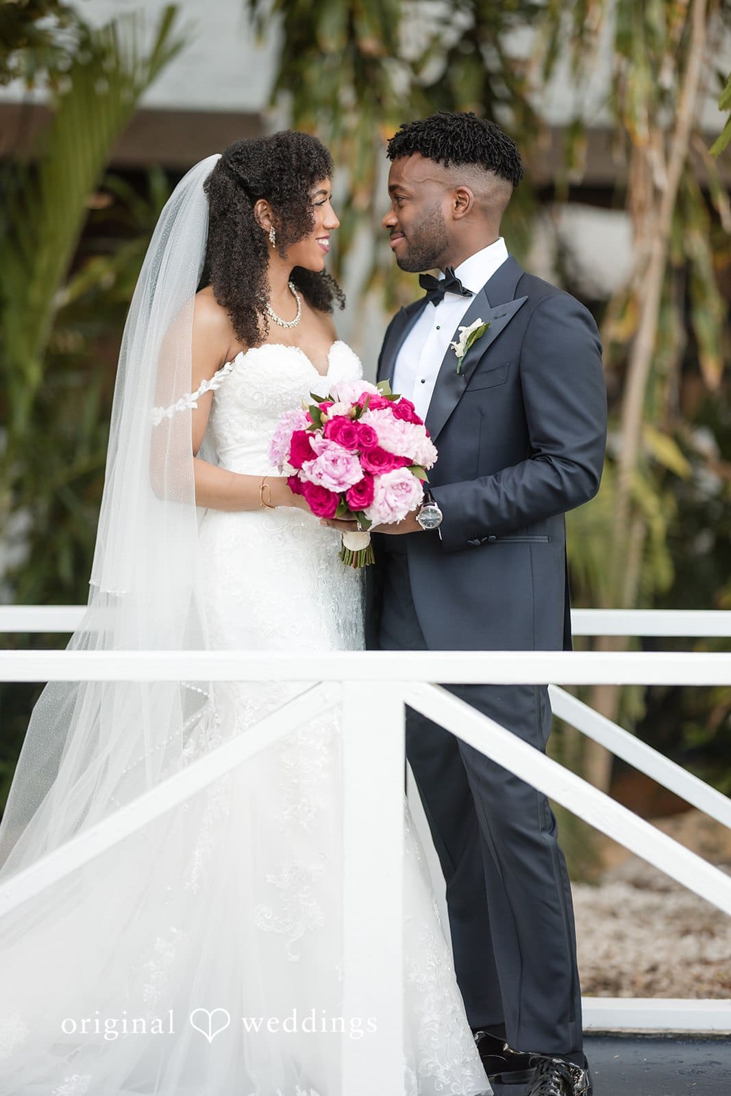 Ramon + Alexandra Couple posing for wedding photos captured by Miami wedding photographer at Bahia Mar Fort Lauderdale