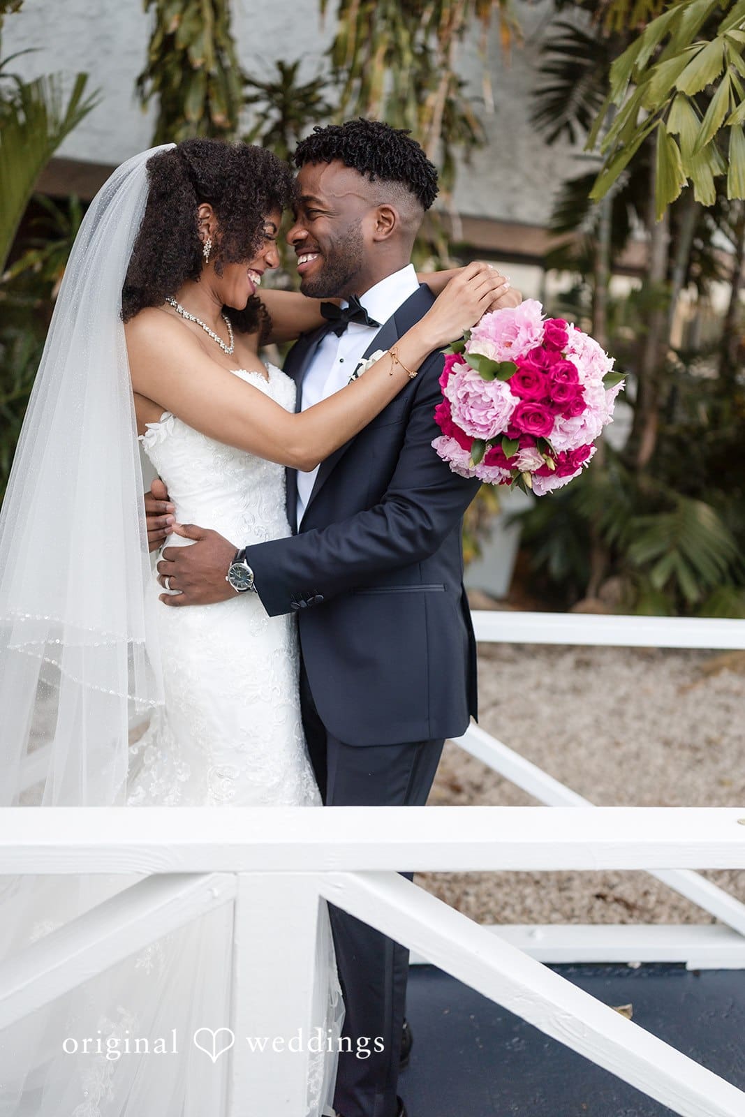 Ramon + Alexandra Newlyweds enjoying beautiful moment captured by Miami wedding photographer at Bahia Mar Fort Lauderdale