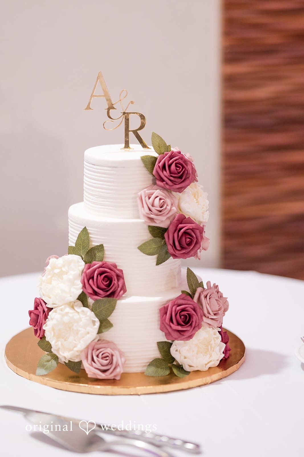 Ramon + Alexandra Beautiful wedding cake with floral design