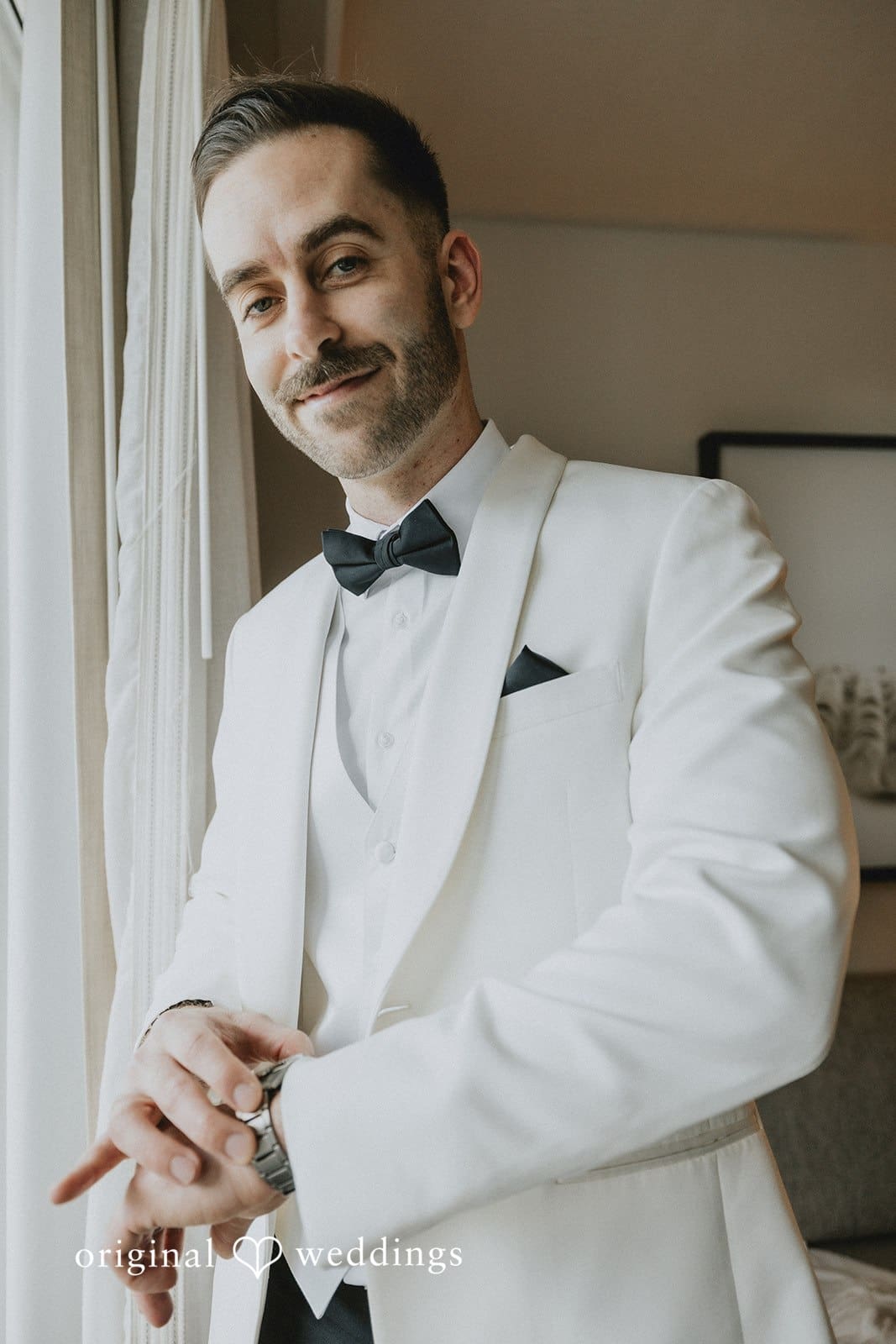 Sabrina + Ryan Portrait of groom in formal wedding attire.