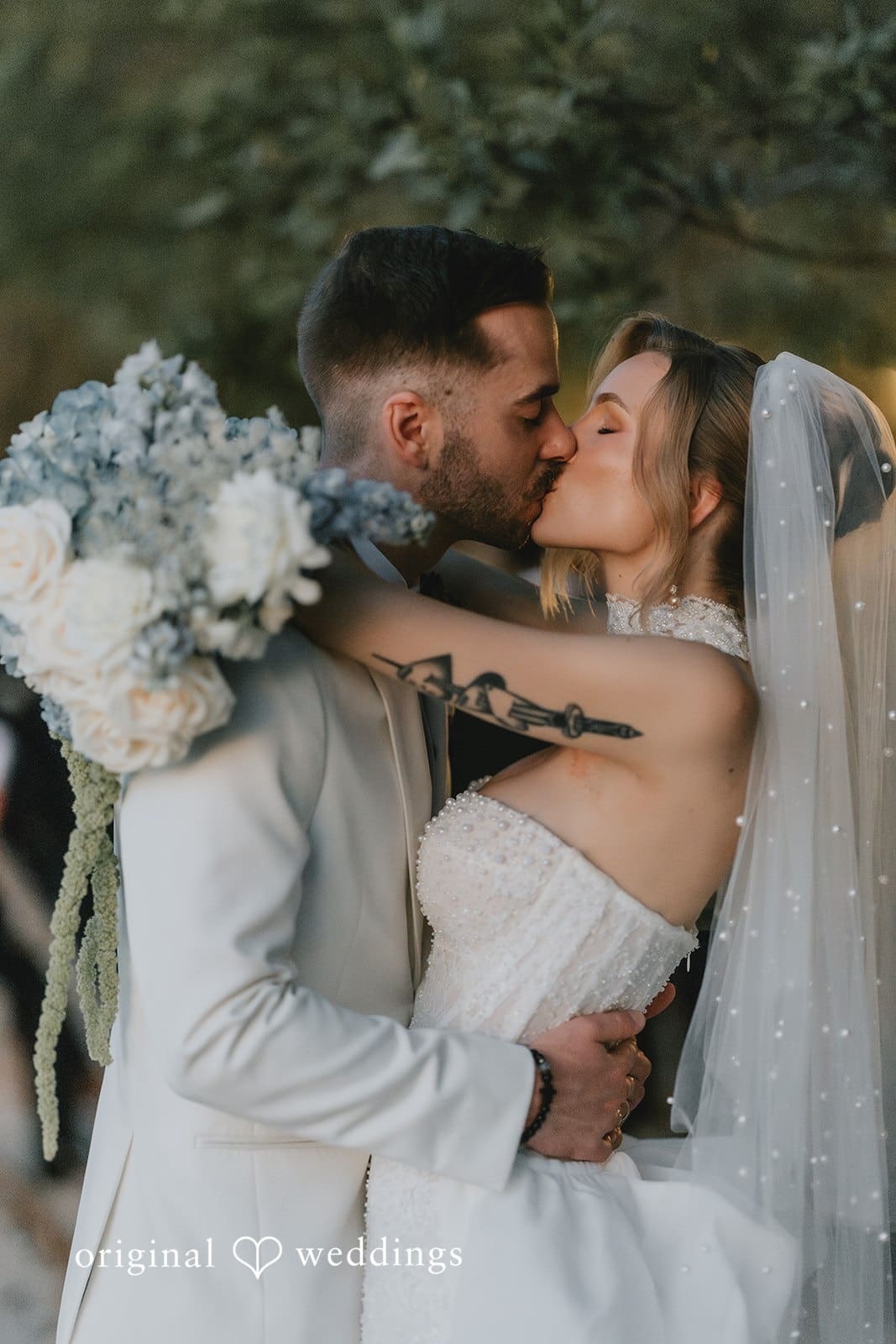 Sabrina + Ryan Romantic wedding kiss moment.