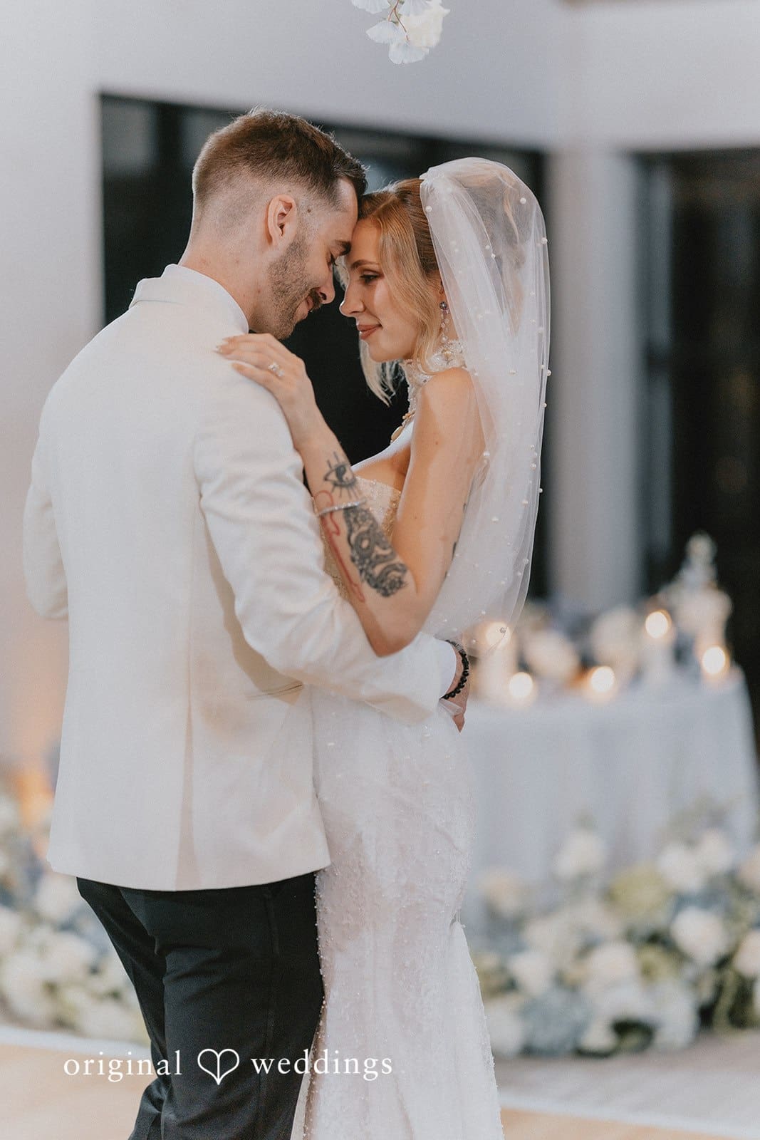 Sabrina + Ryan Bride and groom dancing together on dance floor.