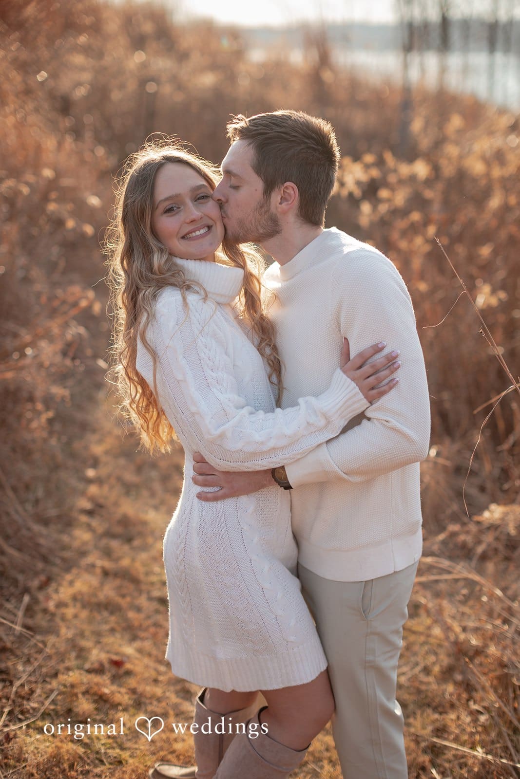 Rosemary + James The groom pecks the bride