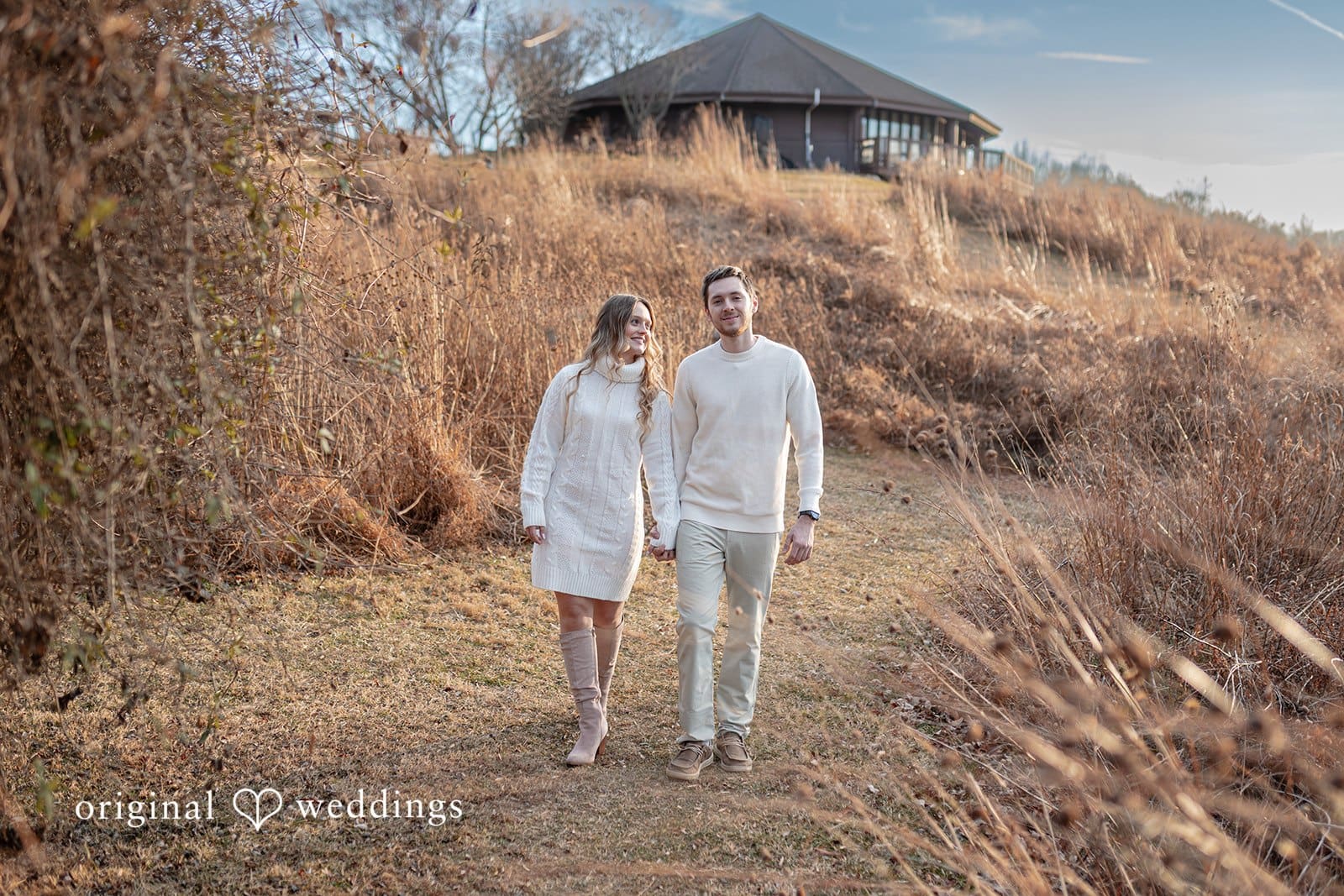Rosemary + James Our Washington DC wedding photographer at Original Weddings captured a romantic portrait of the couple taking a walk at Black Hill Regional Park