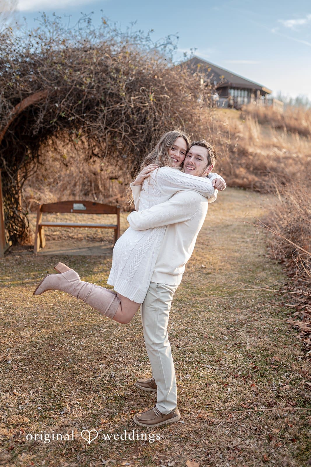 Rosemary + James The groom lifts the bride up