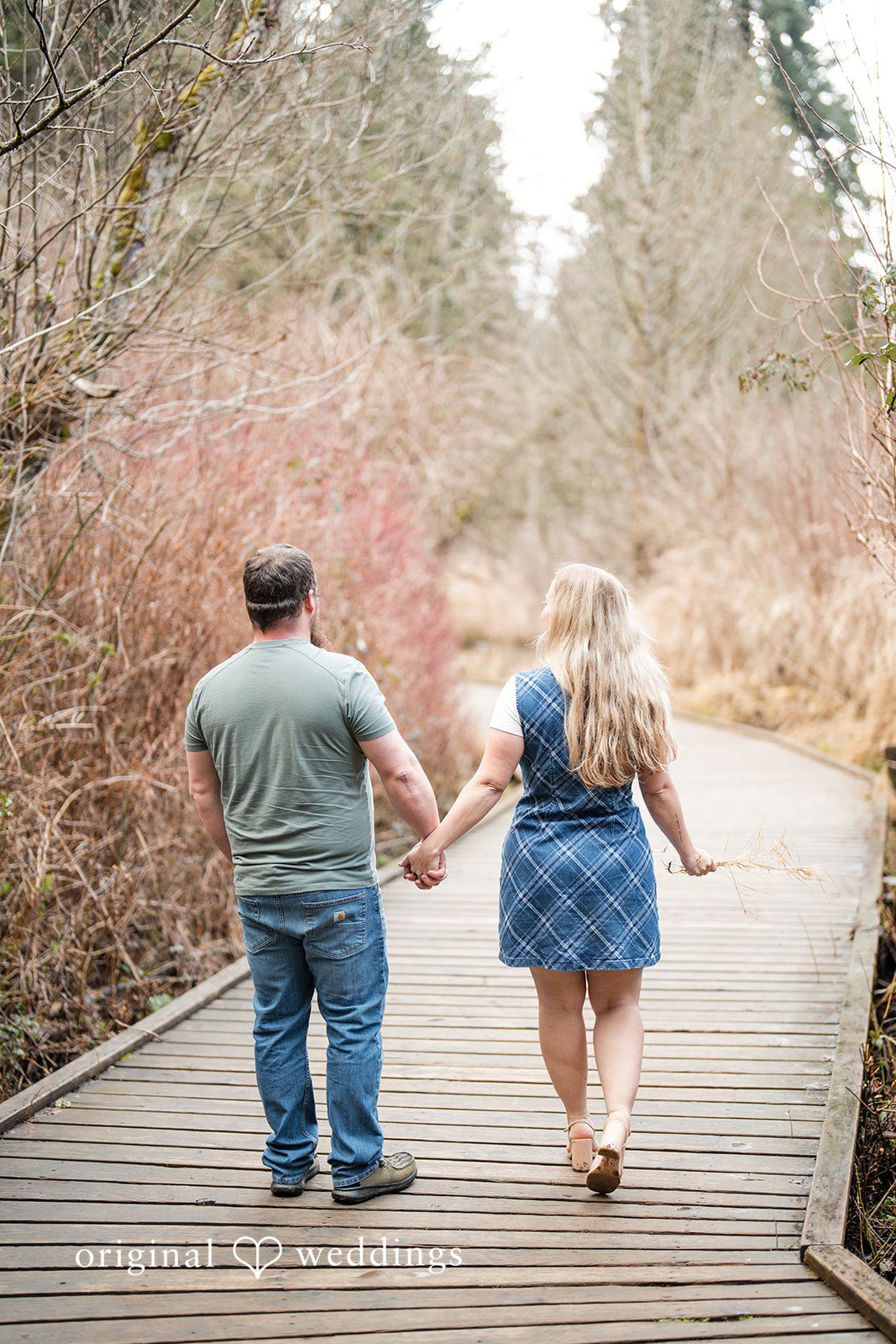Kayla + Dillon Close-up of couple enjoying a walk together at Clark Lake Park