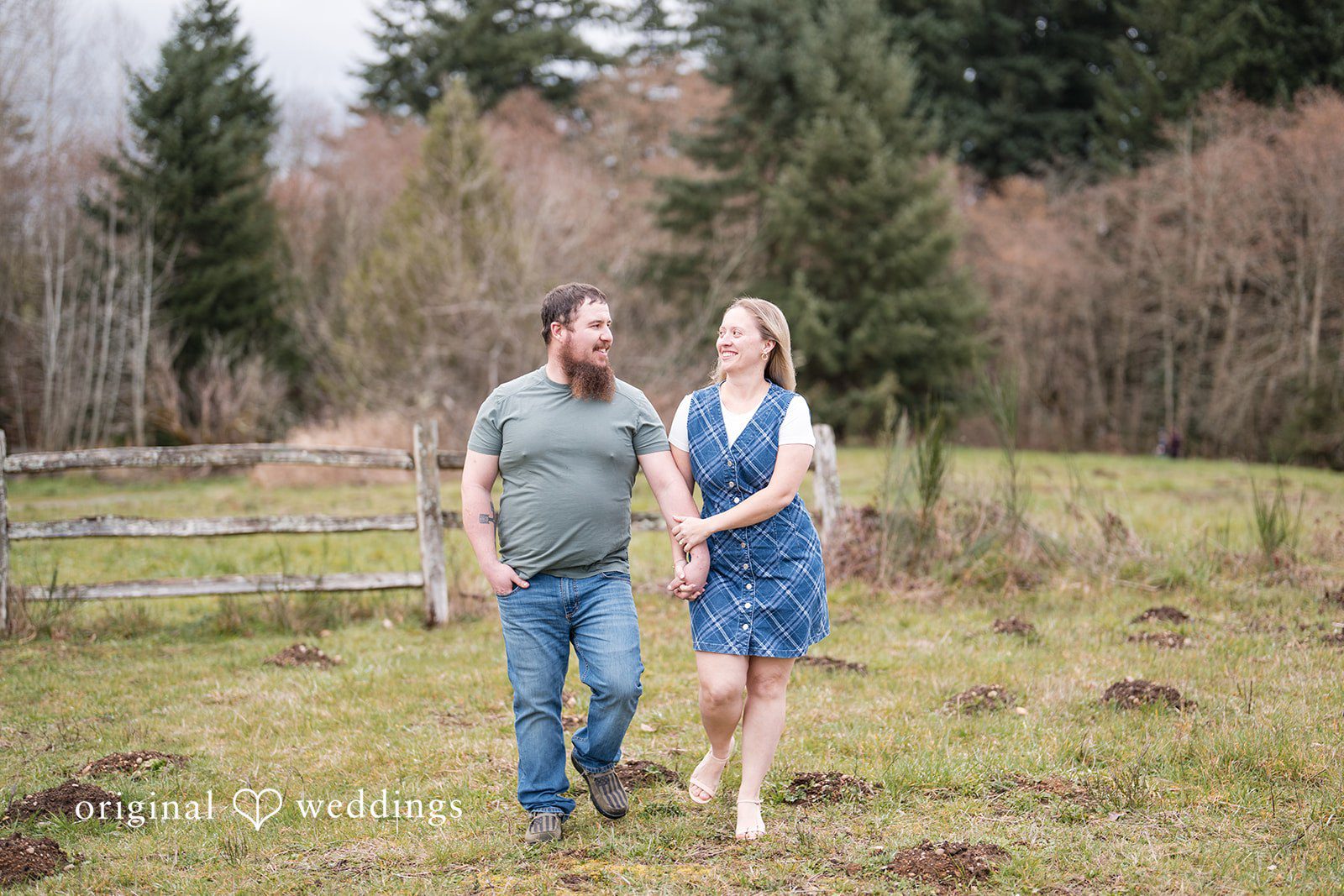Kayla + Dillon Close-up of couple smiling while walking hand-in-hand at Clark Lake Park