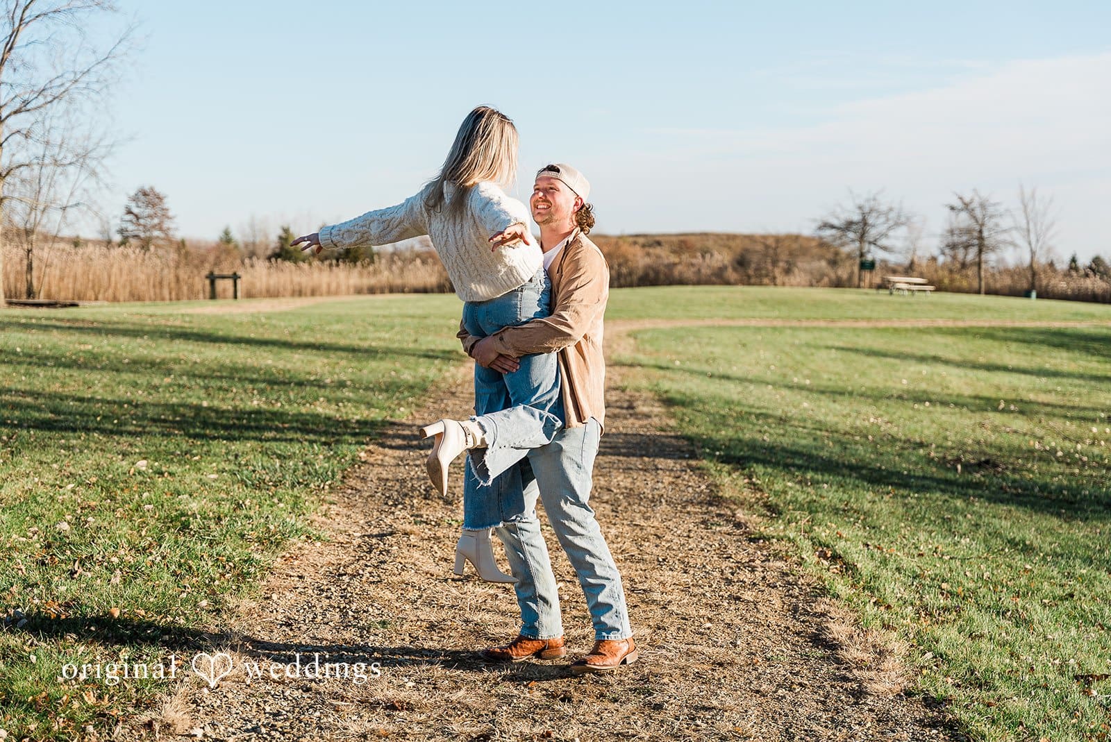 A fun portrait of the couple in Crosswind Marshes' wide field