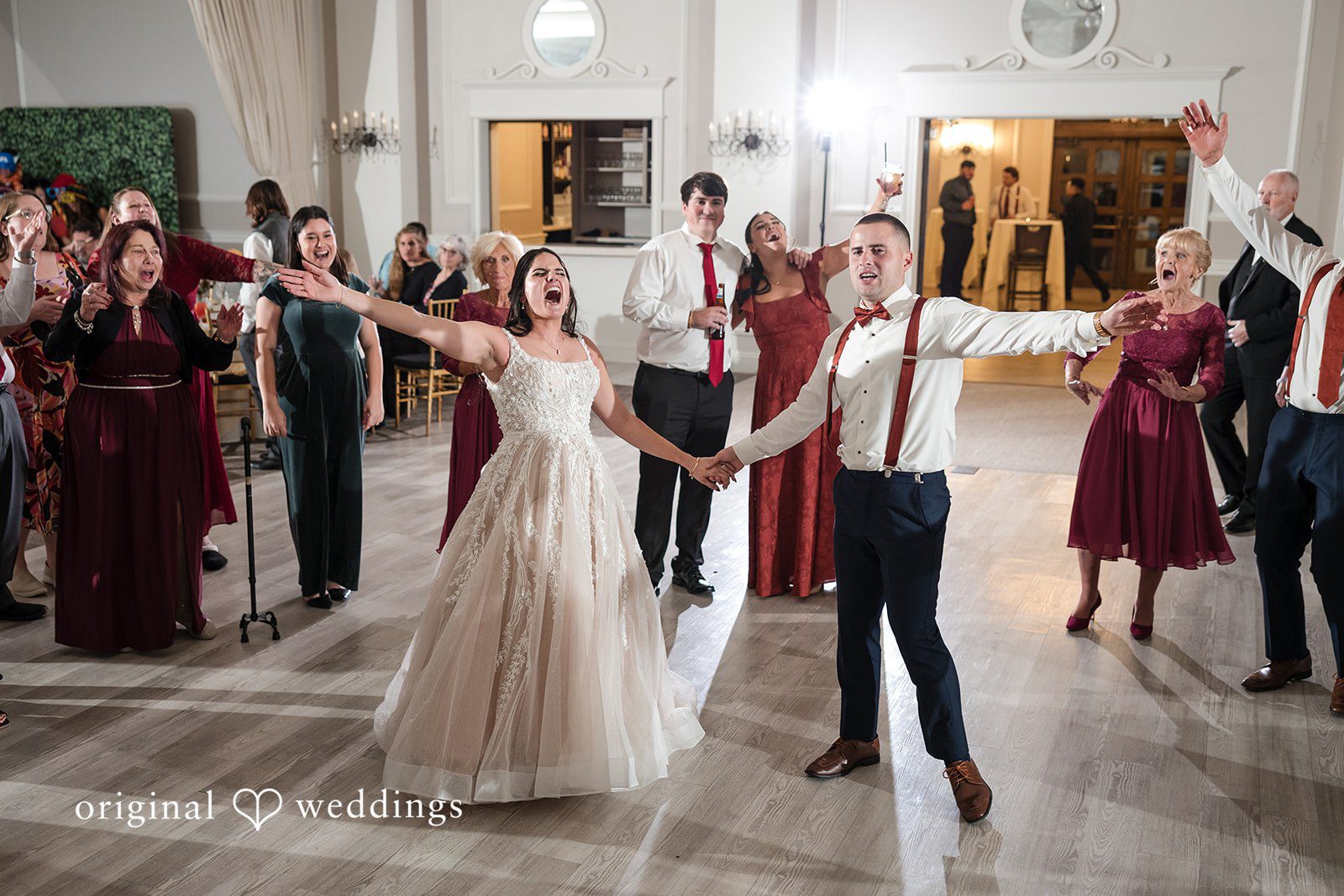 A portrait of the couple at their wedding reception that shows deep emotions