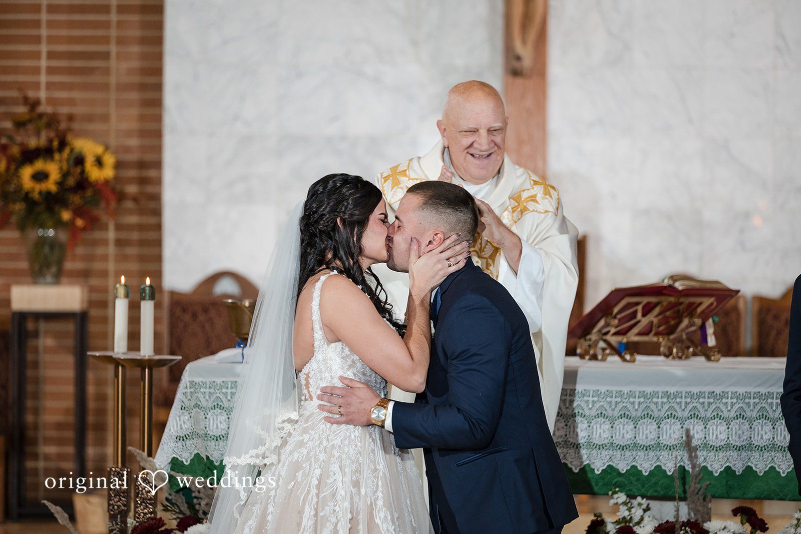 The couple shares their first kiss