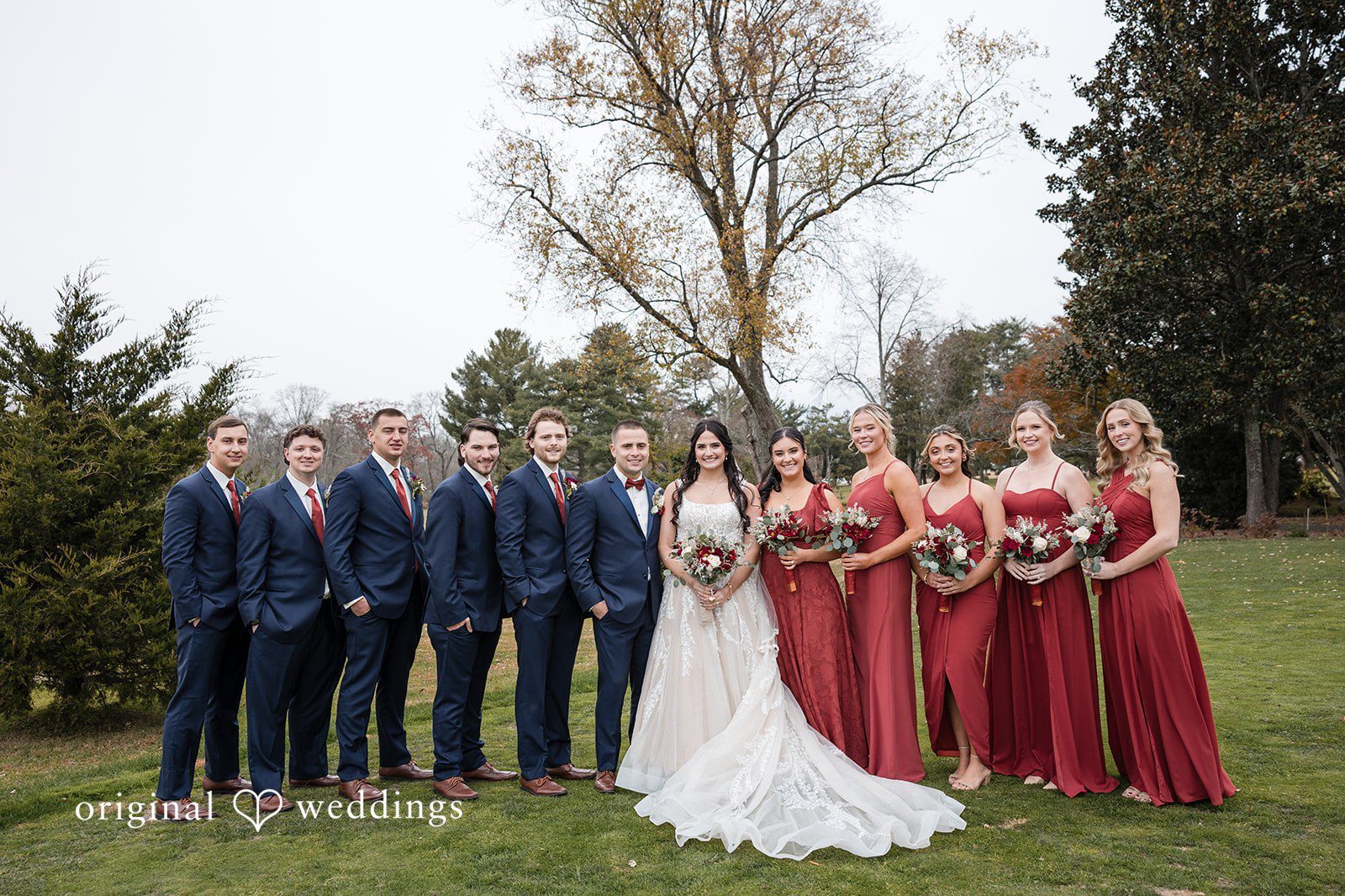 Our Philadelphia wedding photographer at Original Weddings captured a stunning portrait of the couple with their bridal party at Eastlyn Golf Course