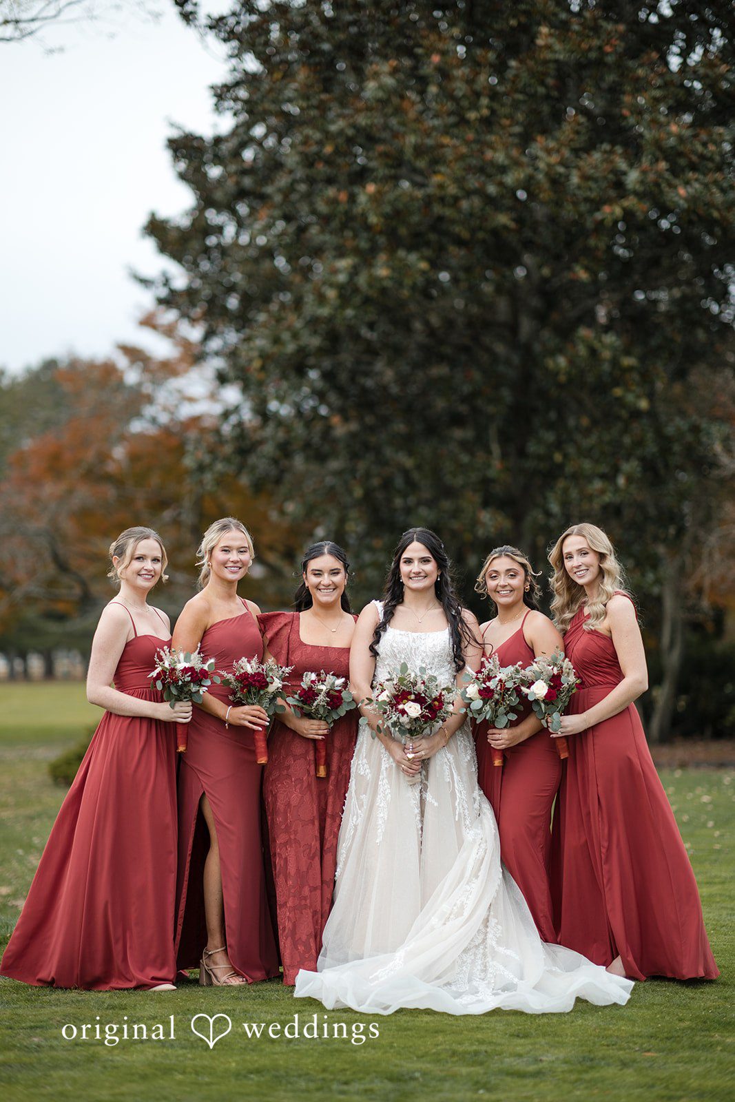 A stunning portrait of the bride and her bridesmaids