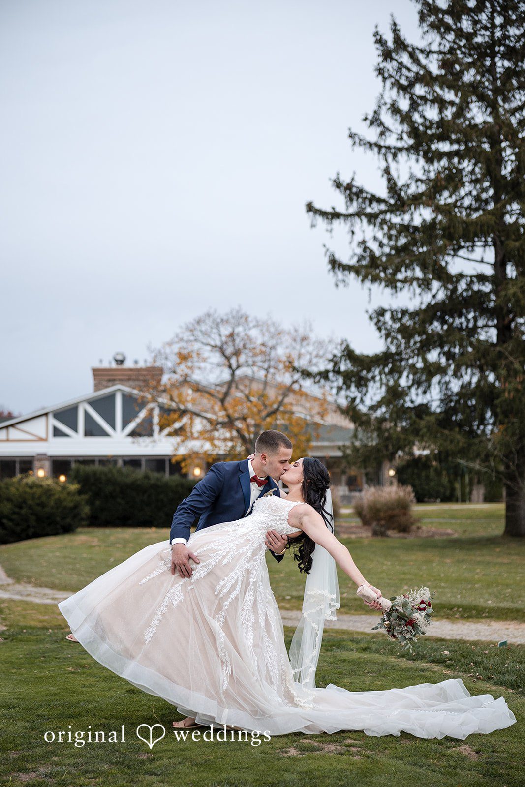 The couple shares a kiss