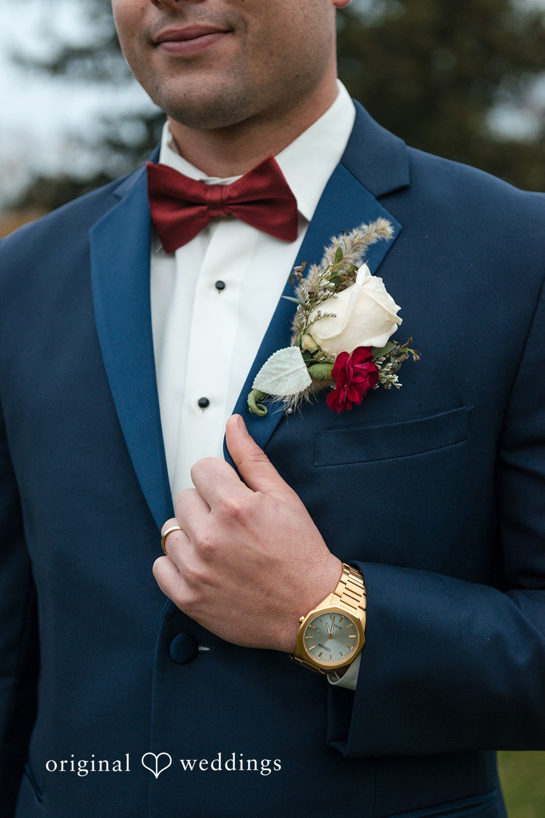 A close-up shot of the groom