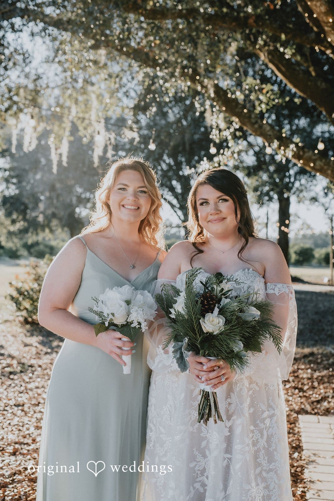 A stunning portrait of the bride and her bridesmaid at Ever After Farms Citrus