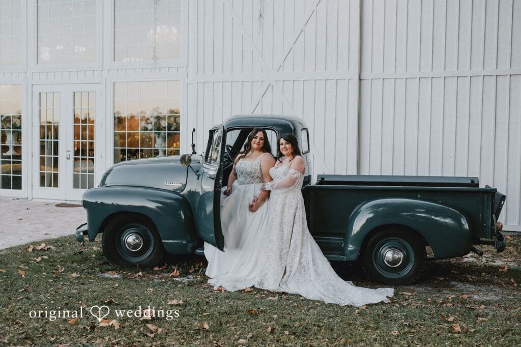 Marisa + Jessica Our Orlando wedding photographers at Original Weddings captured a stunning portrait of the couple beside their car at Ever After Farms Citrus