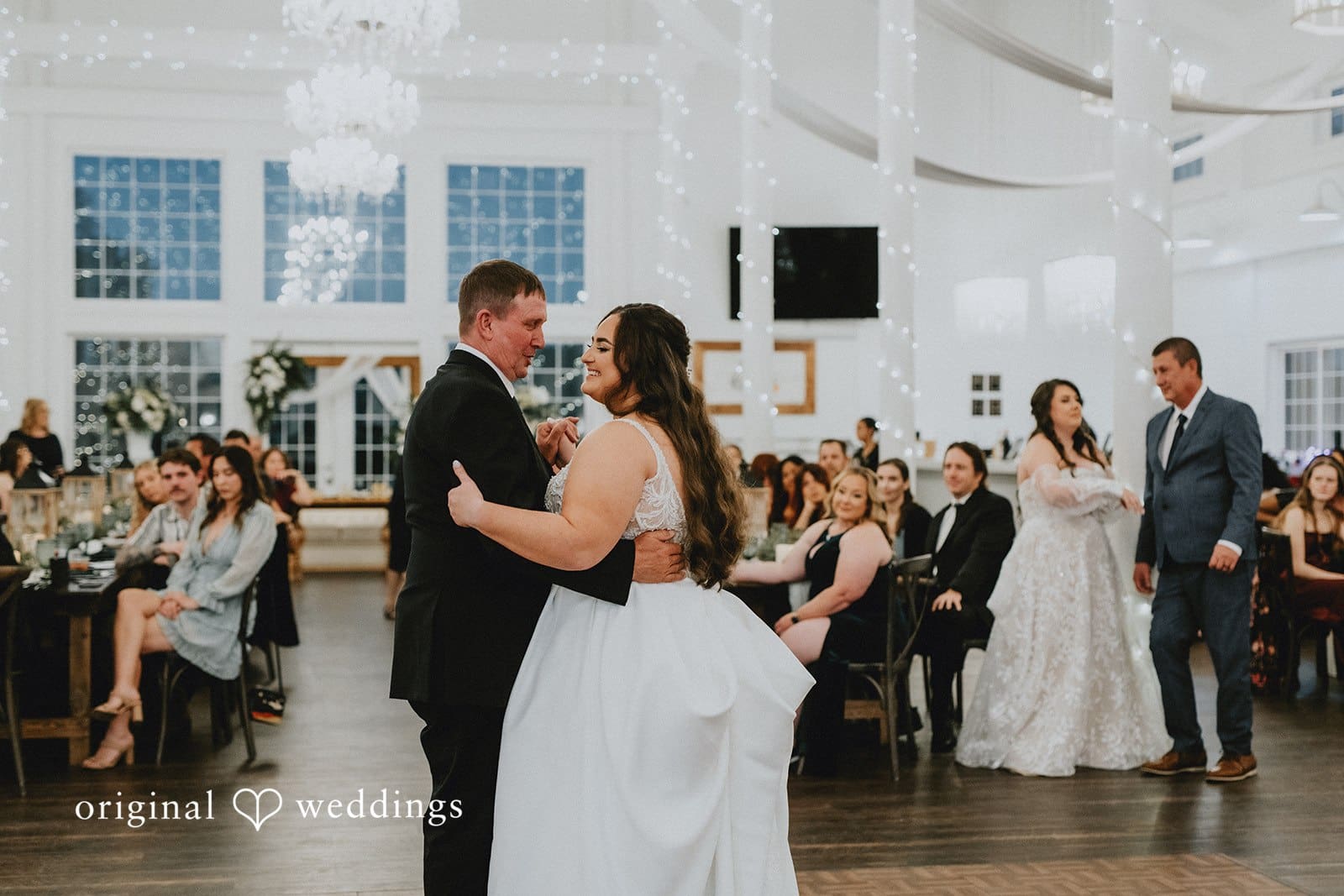 The bride dances with her father