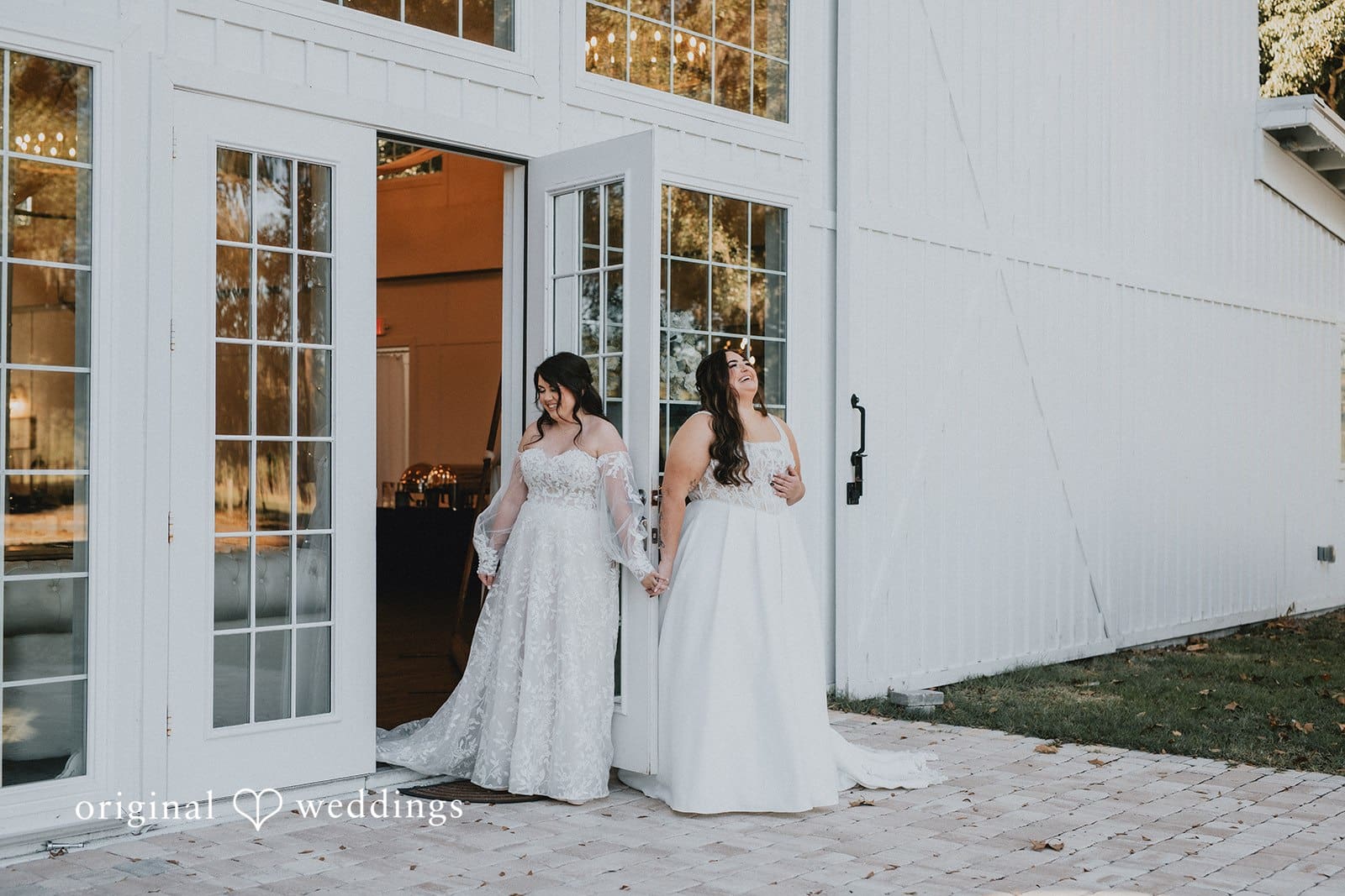 A joyful portrait of the couple by the door at Ever After Farms Citrus