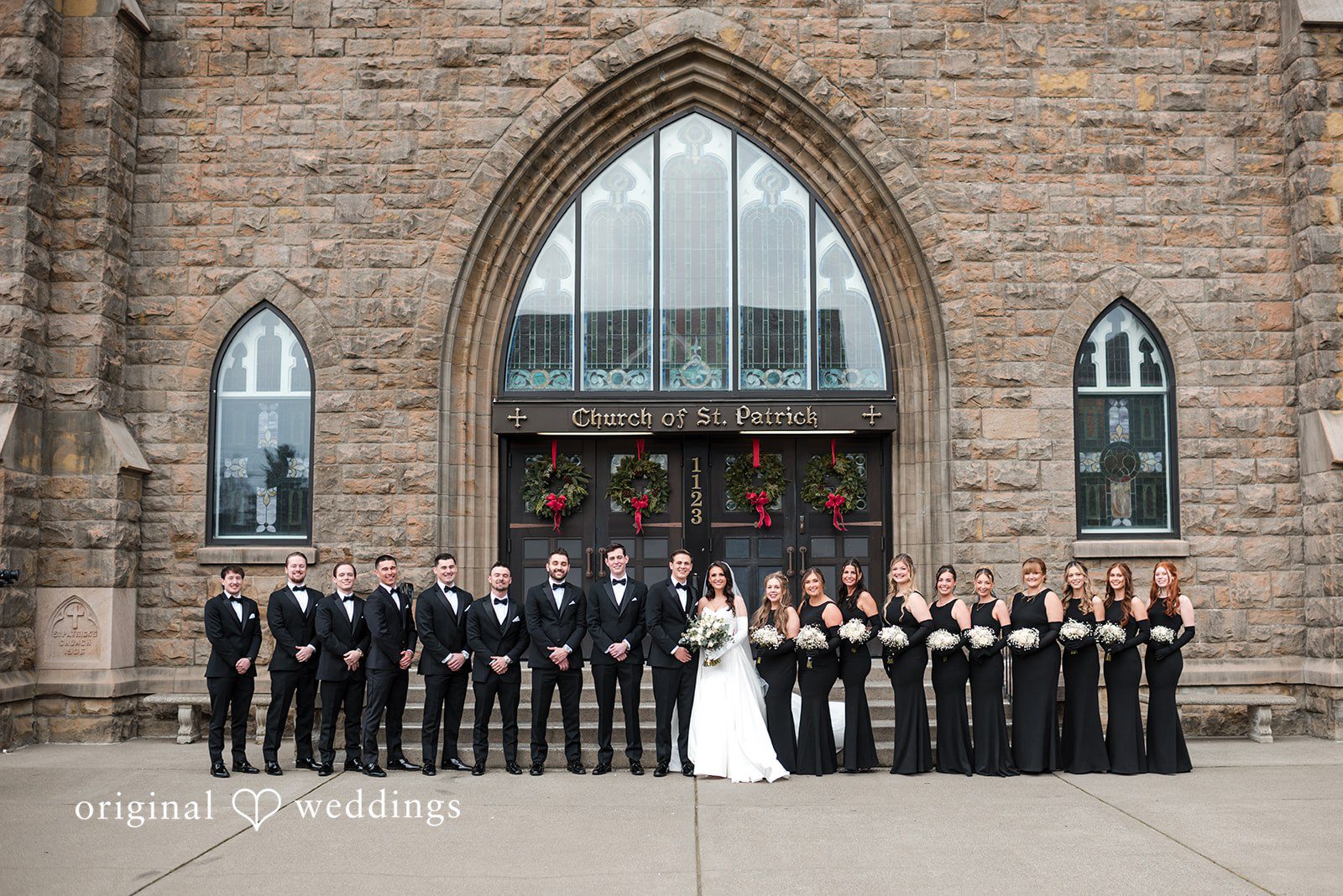 Kristi + Andrew Wedding guests posing at Foss Waterway Seaport