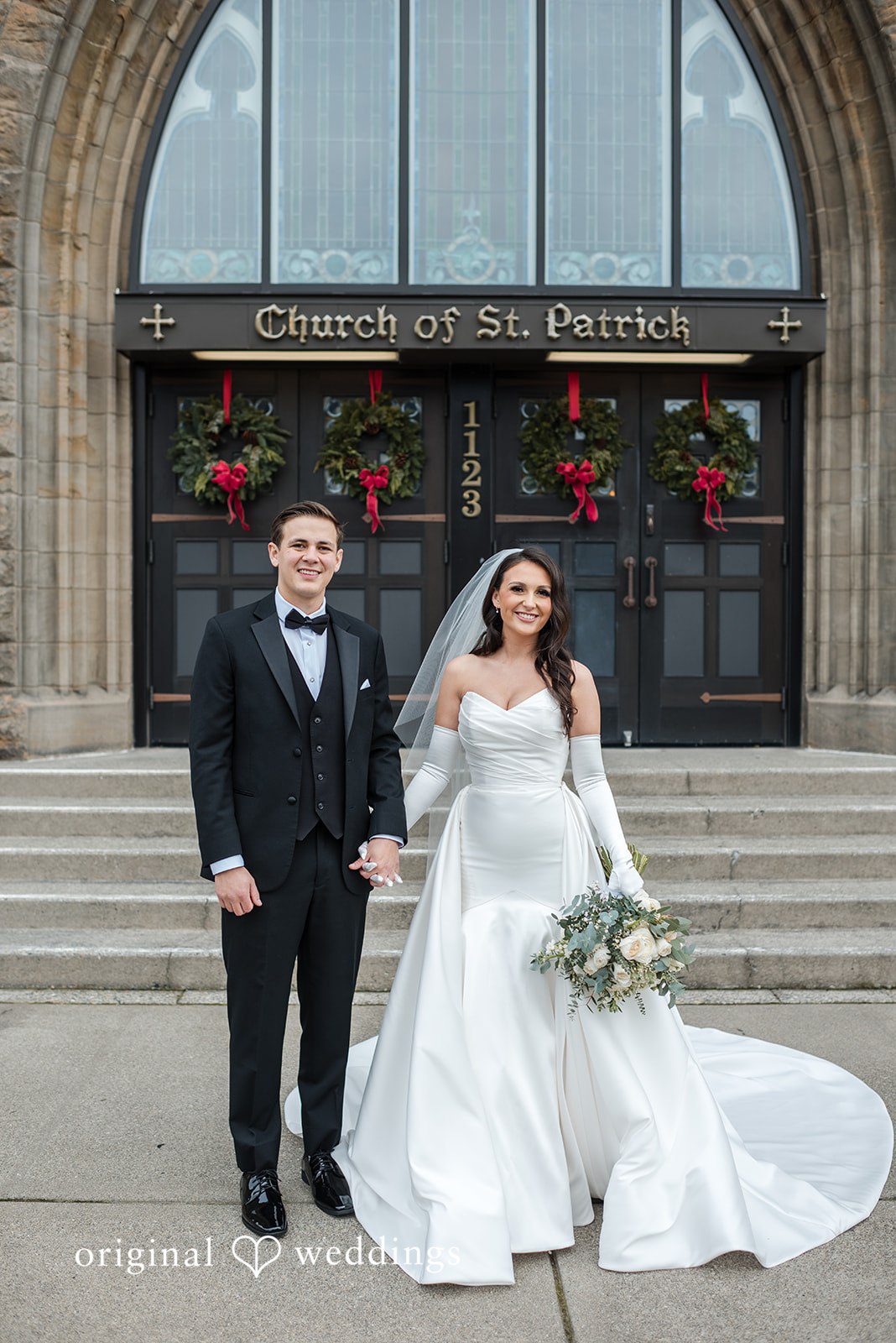 Kristi + Andrew Romantic newlyweds walking hand in hand at Foss Waterway Seaport photographed by Seattle wedding photographer from Original Weddings