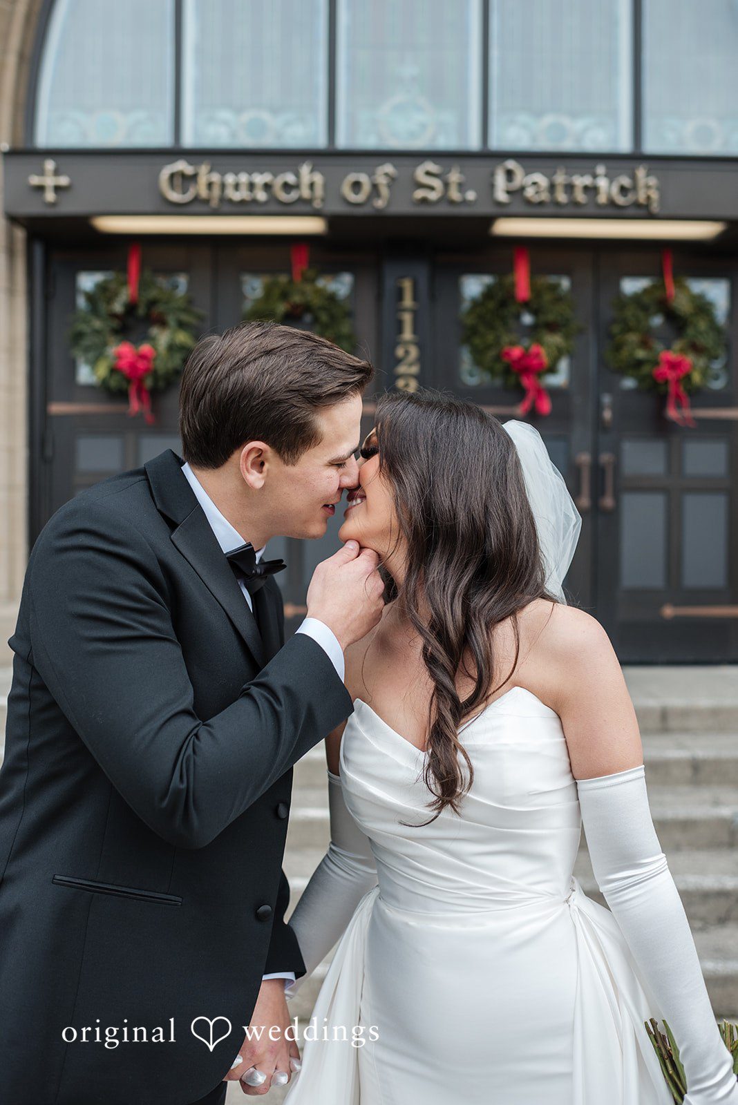 Kristi + Andrew Newlyweds sharing kiss as husband and wife