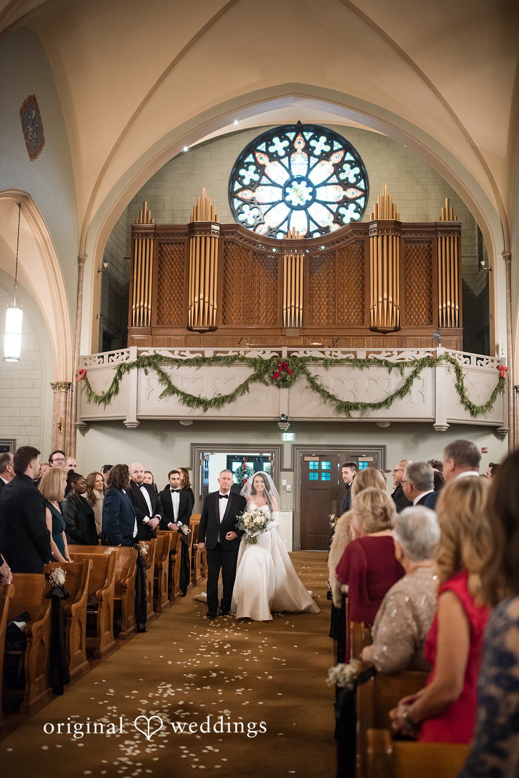 Kristi + Andrew Bride walking for ceremony at Foss Waterway Seaport