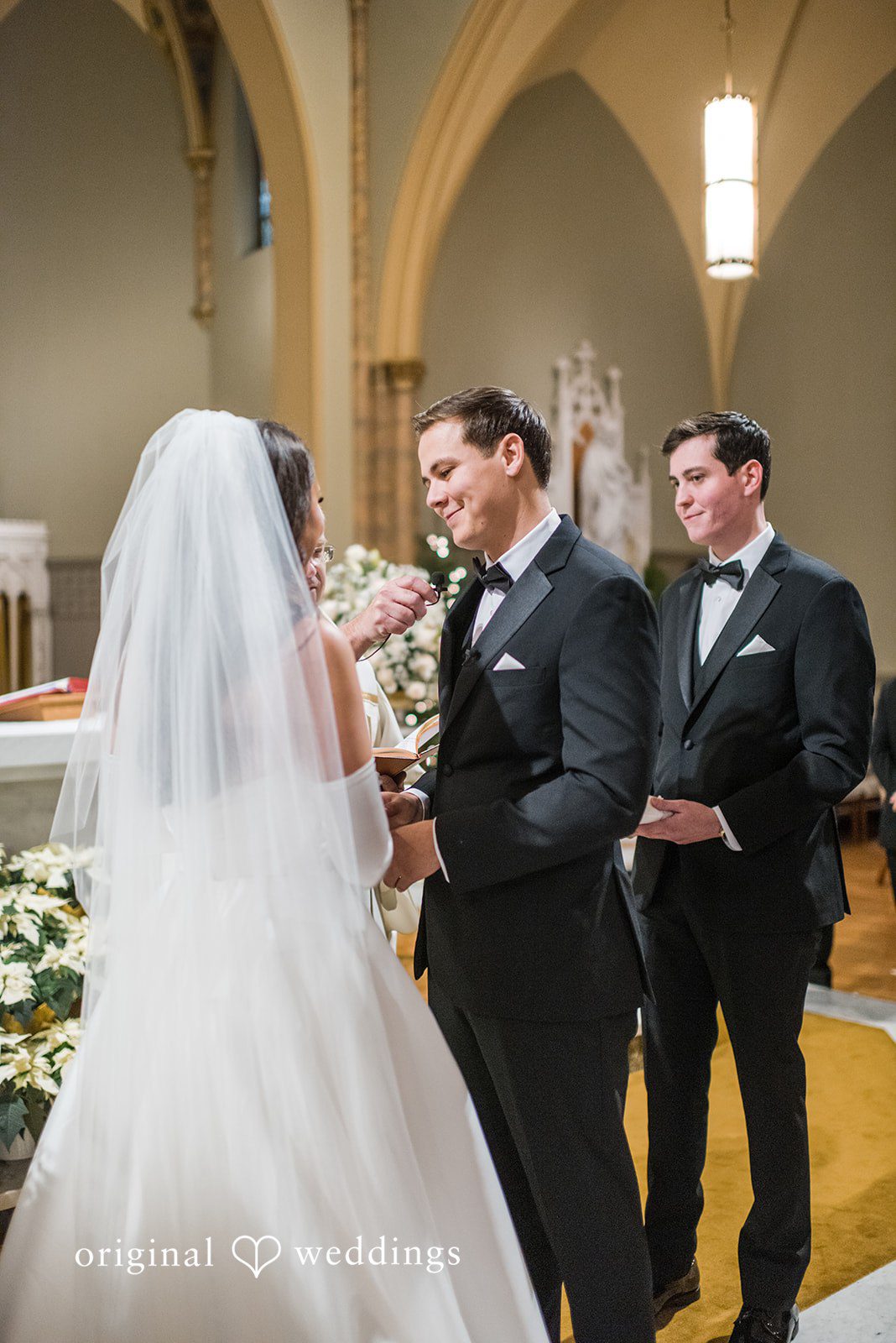 Kristi + Andrew Emotional wedding moment as groom speaks to bride while holding her hand