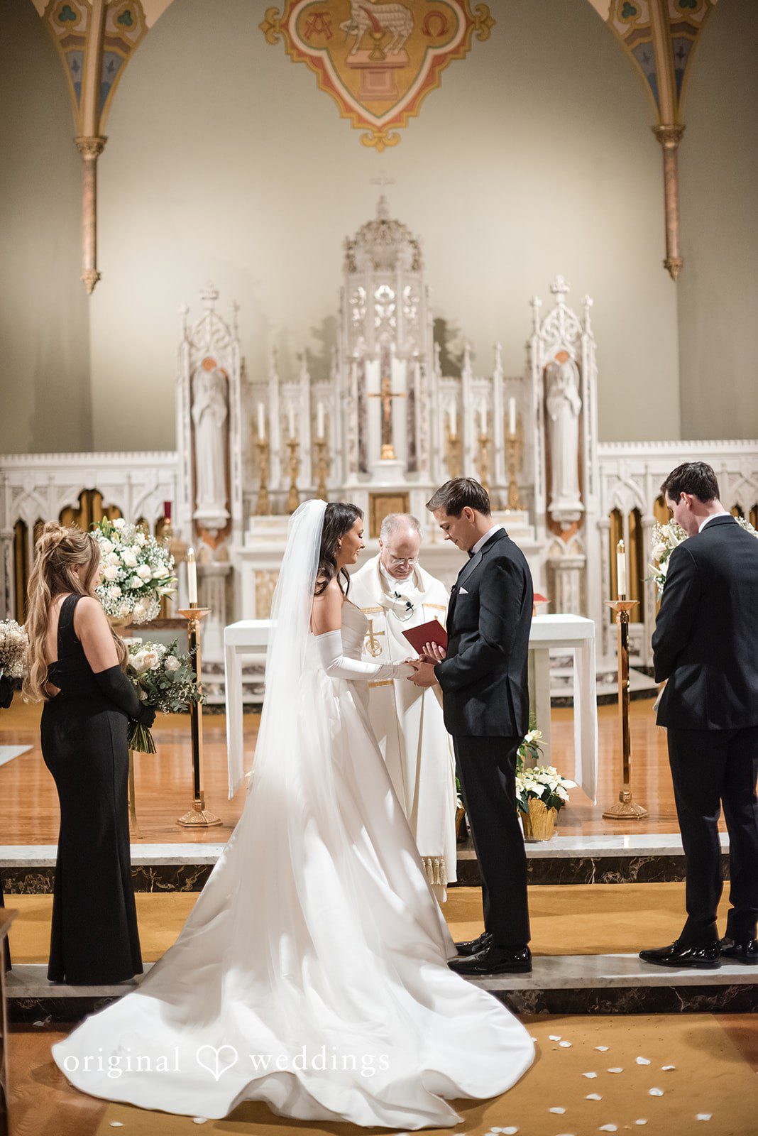 Kristi + Andrew Emotional ring exchange moment as groom puts ring on bride’s hand