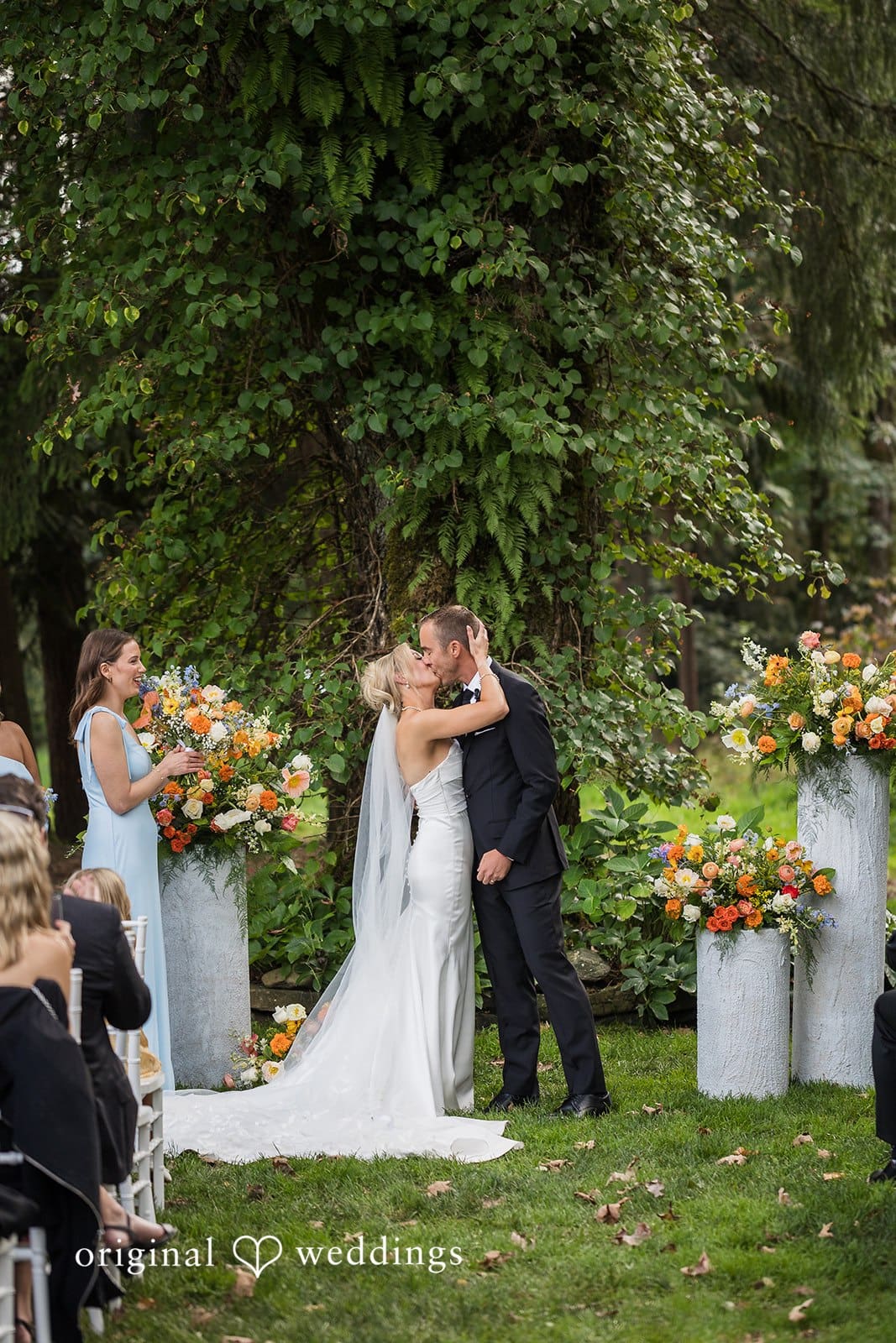 Romantic couple portraits at Fox Hollow Farm Wedding surrounded by greenery
