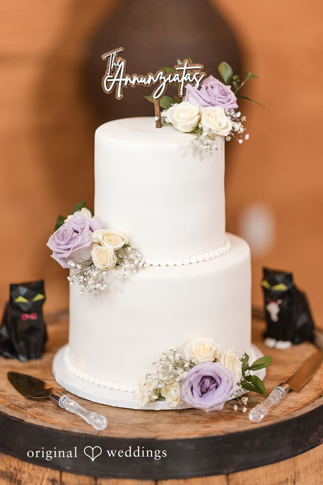 White wedding cake with soft floral decorations